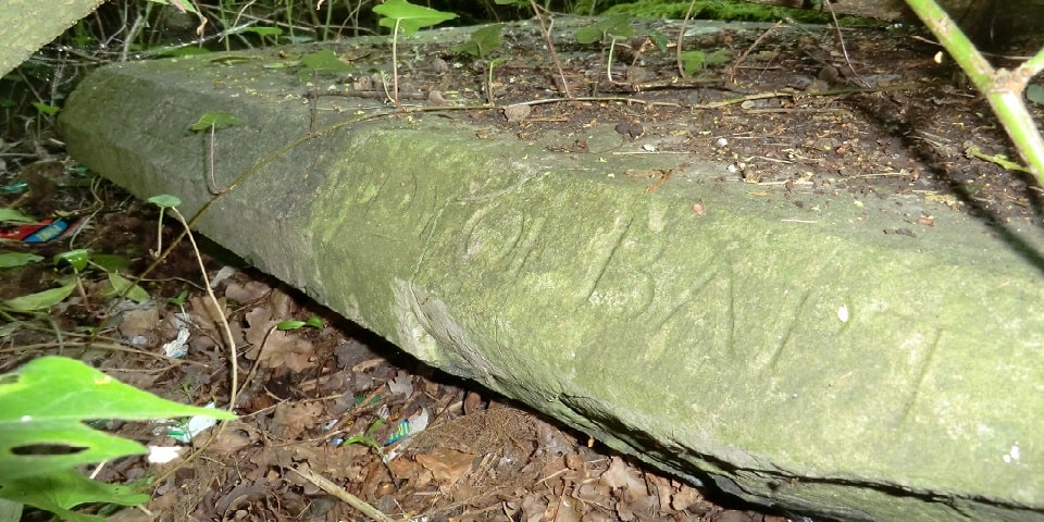 The gravestone of Baptist Willoughby in the garden of Haslemere,
44 Old Church Lane..