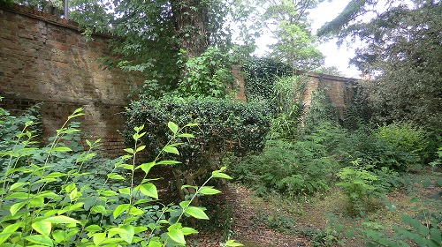 Part of the Grade II listed wall