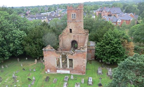 The brick Church ruin of St John the Evangelist Great Stanmore, as seen from the bell tower of the present Church.