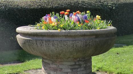 The drinking fountain bowl, situated on a small green
in front of St. Johns Church, Great Stanmore.
