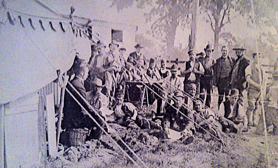 A group of navvies in front of their tents 1889-1890,when they were building the Stanmore Railway. The site is now part of Abercorn Rd